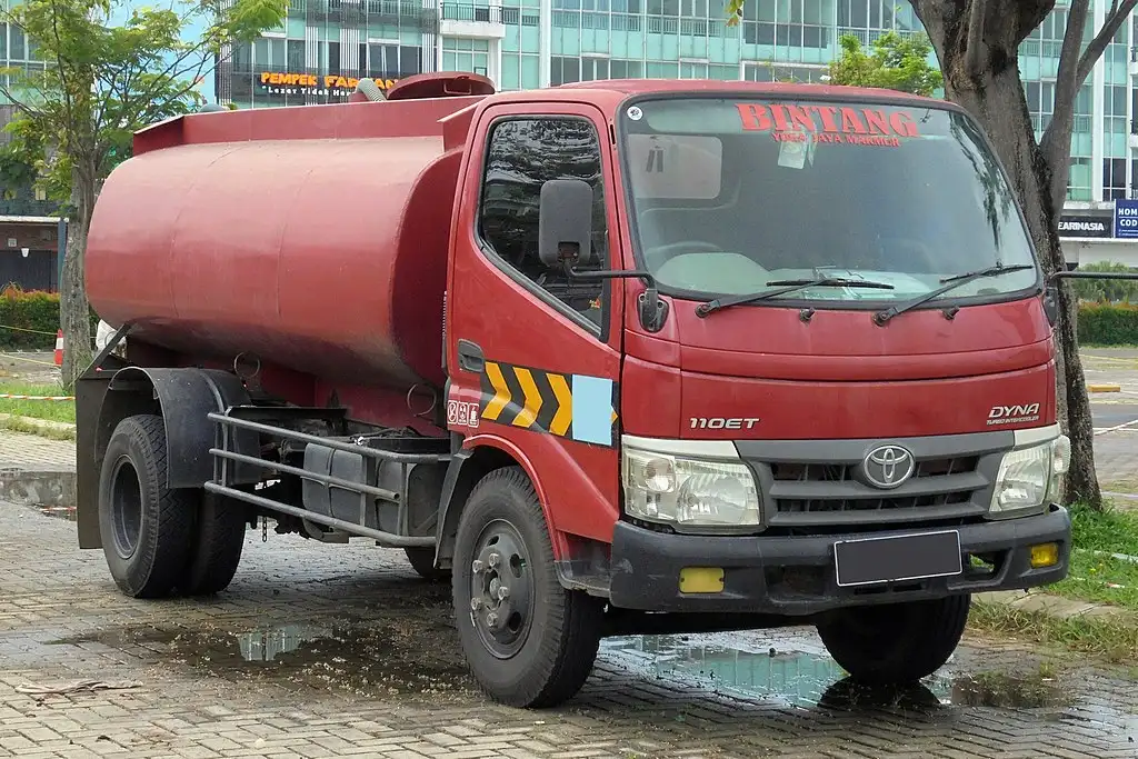 Red Toyota Dyna Truck.